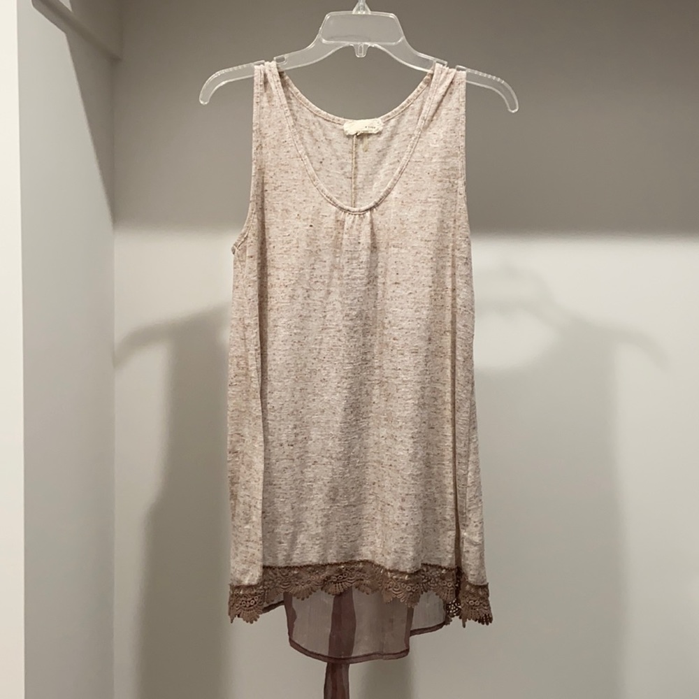 Large sleeveless top with see through back